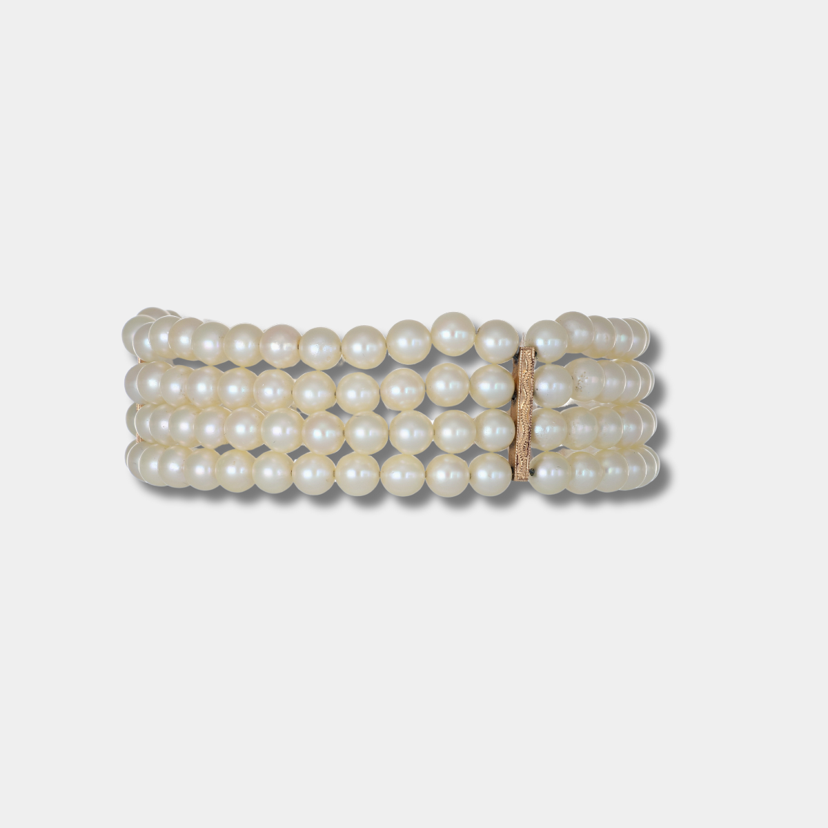Importante bracciale con fili di perle rubini e diamanti e susta in oro massiccio