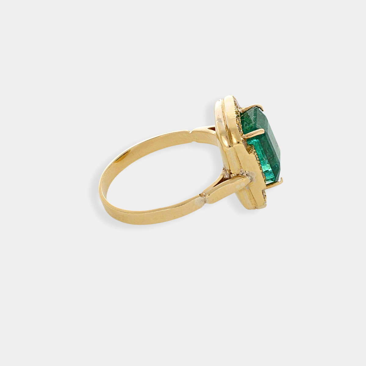 Anello Liberty in oro 18 kt con diamanti e smeraldo