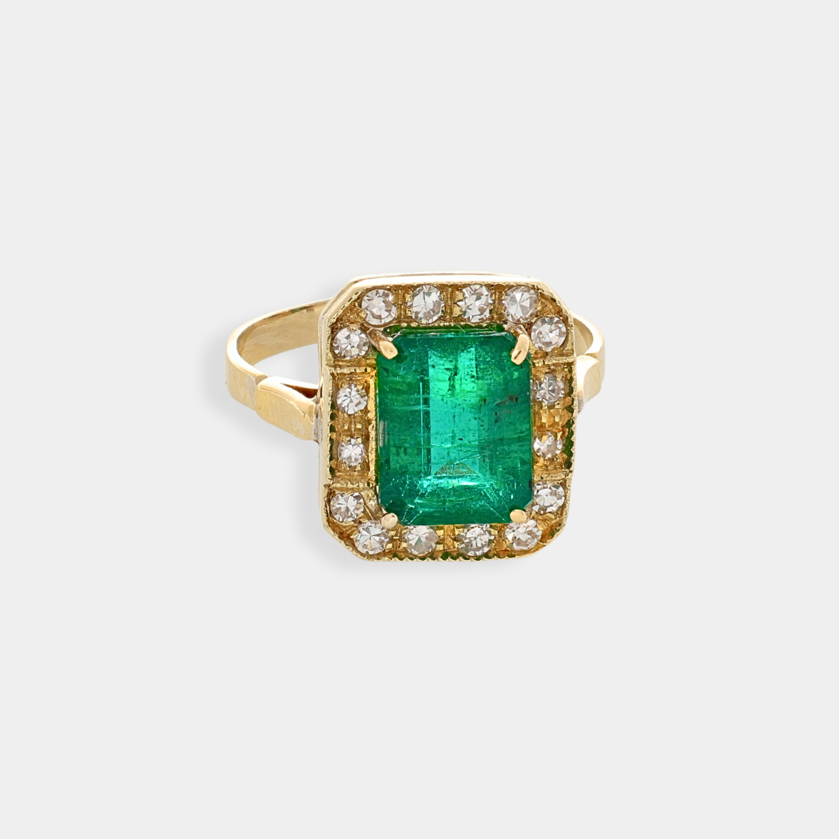 Anello Liberty in oro 18 kt con diamanti e smeraldo
